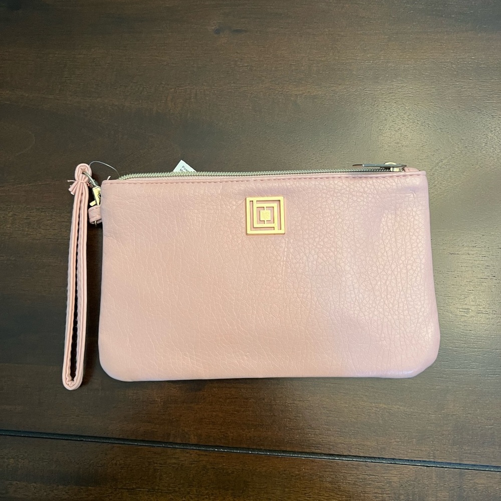 Pink wristlet with potable charger